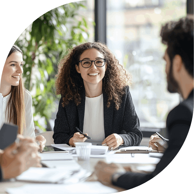 Person with glasses in a meeting